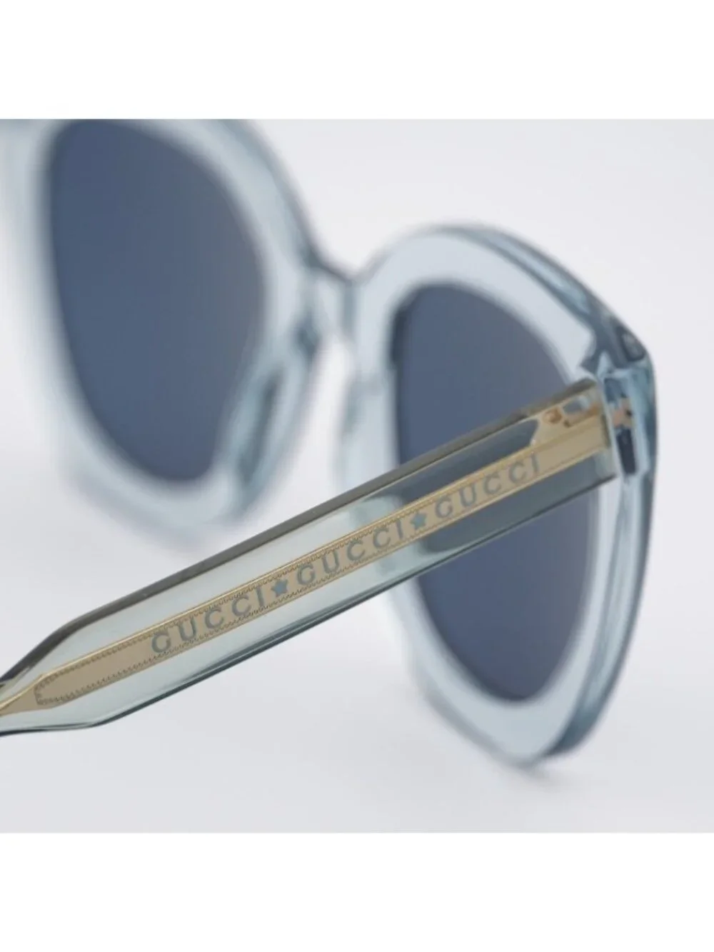 Gucci GG0564S 003 Sunglasses Light Blue Cat Eye Frame, Blue Lenses